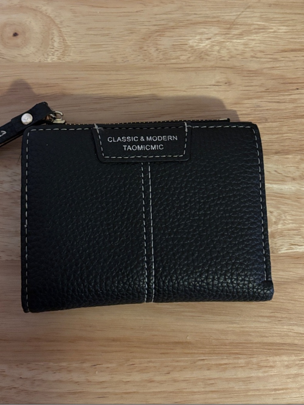 Black Bifold Pebble Wallet with White Stitching